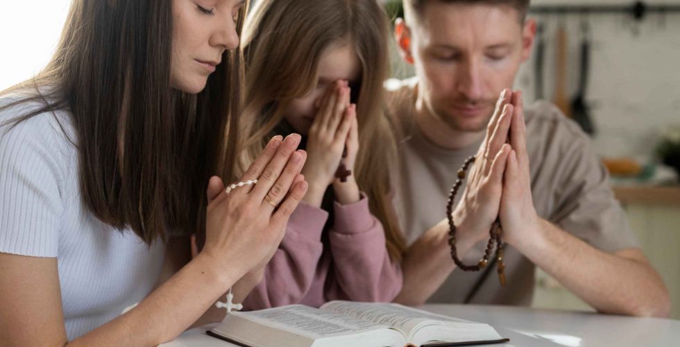 christian-people-praying-together-medium-shot (1)