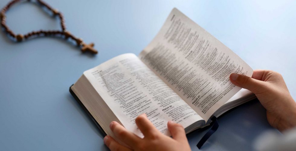 high-angle-kid-holding-bible (1)